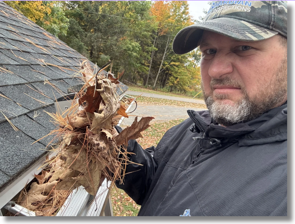 Gutter cleaning service being performed in Central Maine